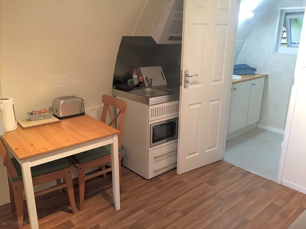 Kitchen area view of glamping pod accommodation